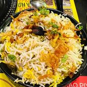 Cheesy butter chicken biryani
